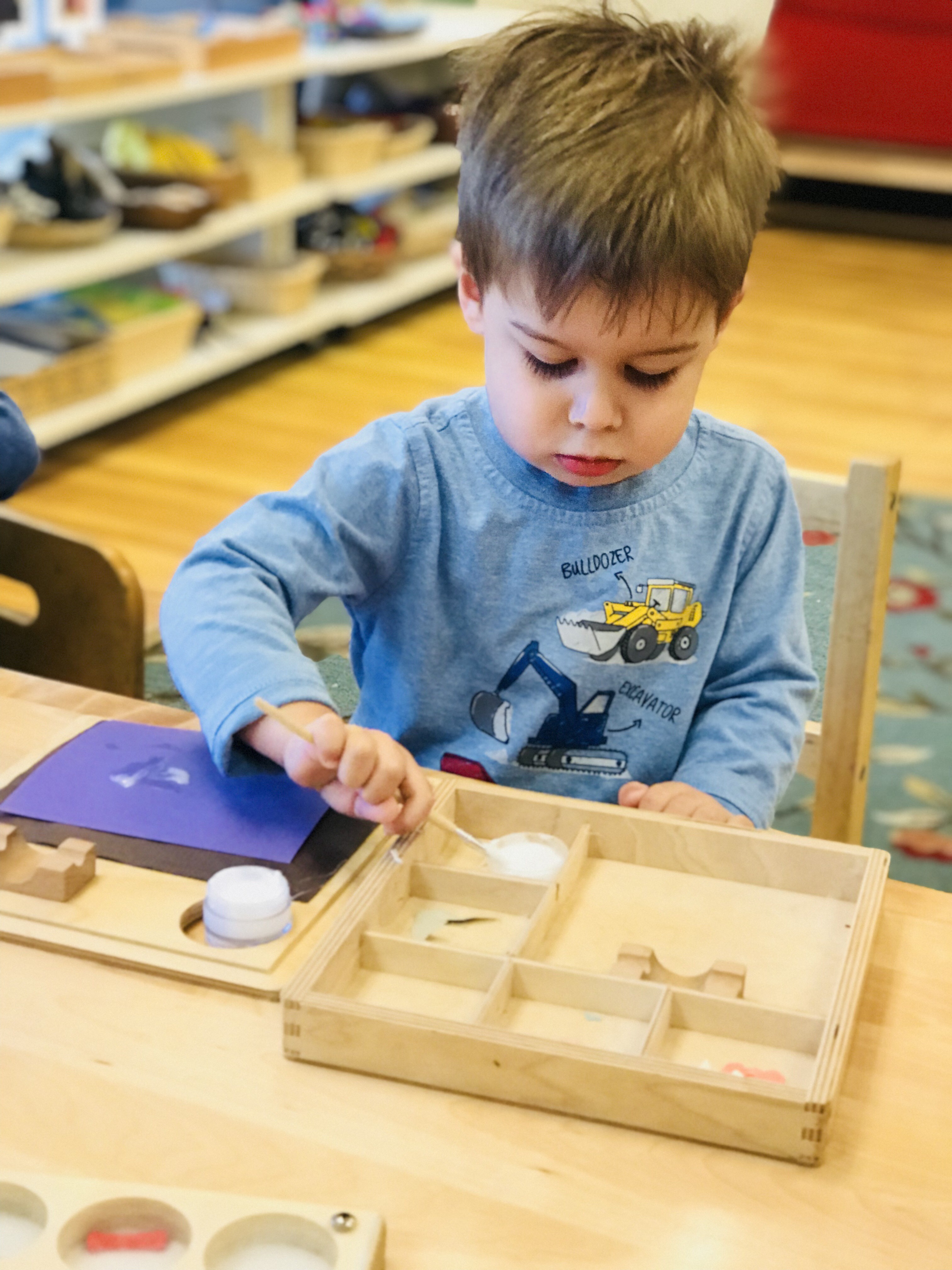 Boy in Montessori preschool