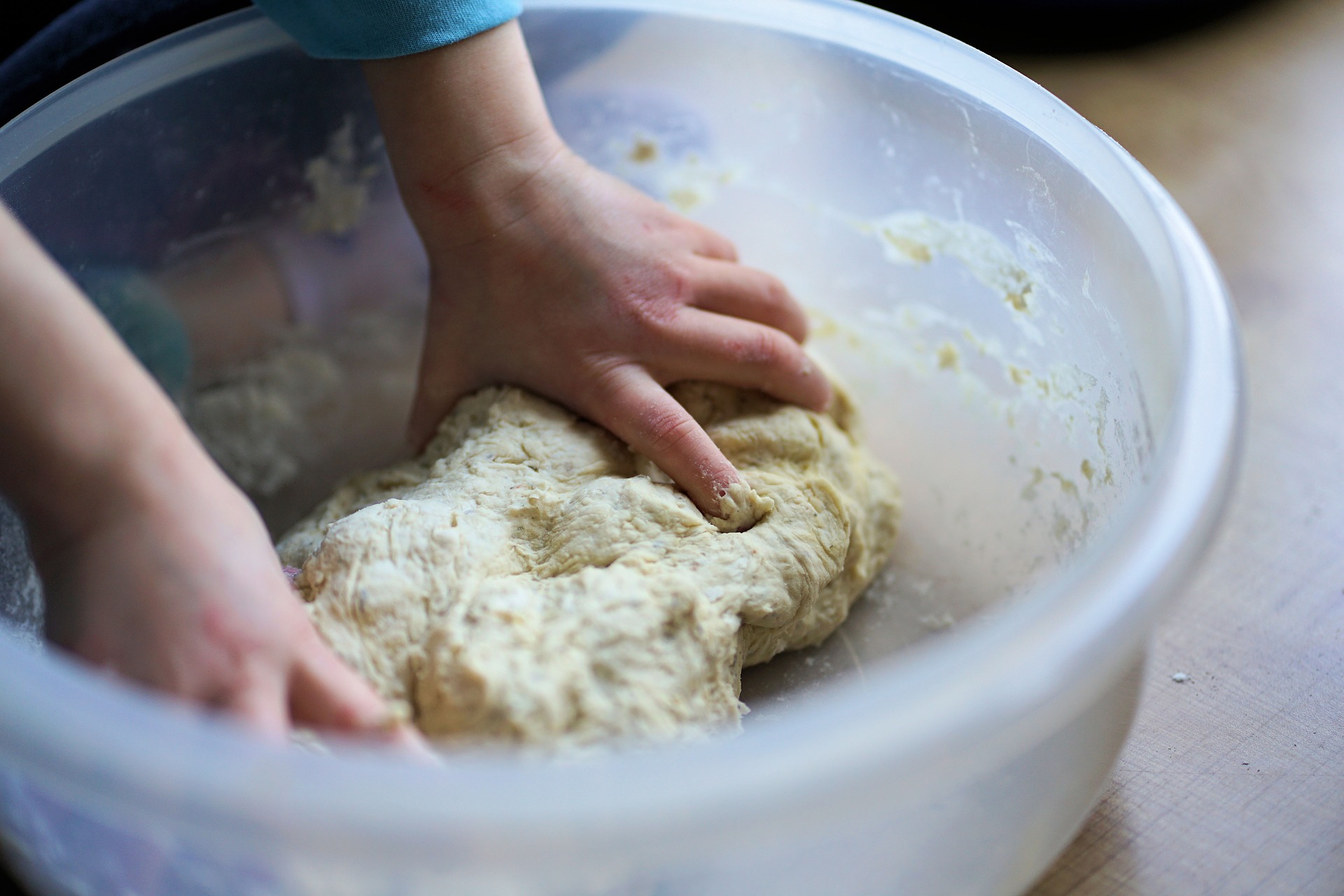 Kid kneading dough