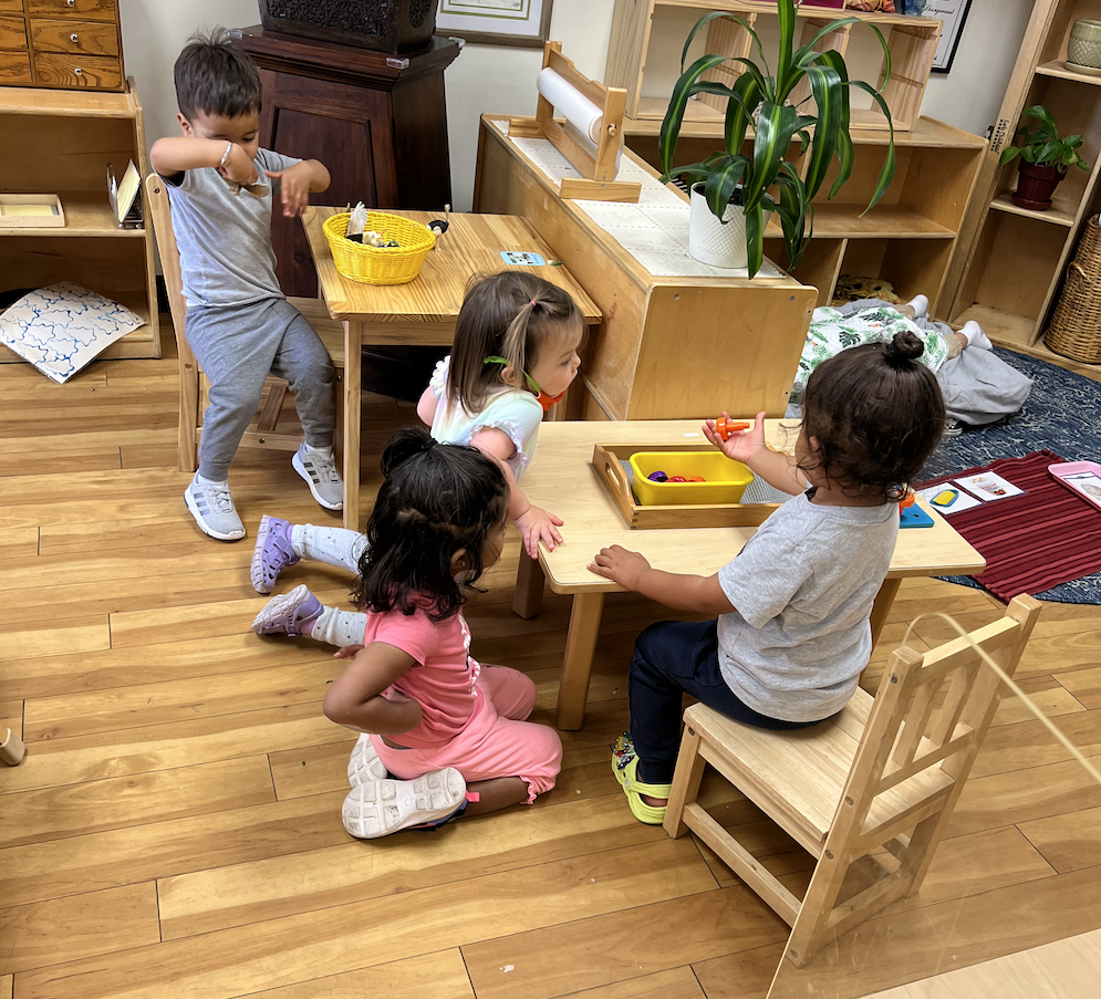 Children working independently in a Montessori Classroom in San Diego