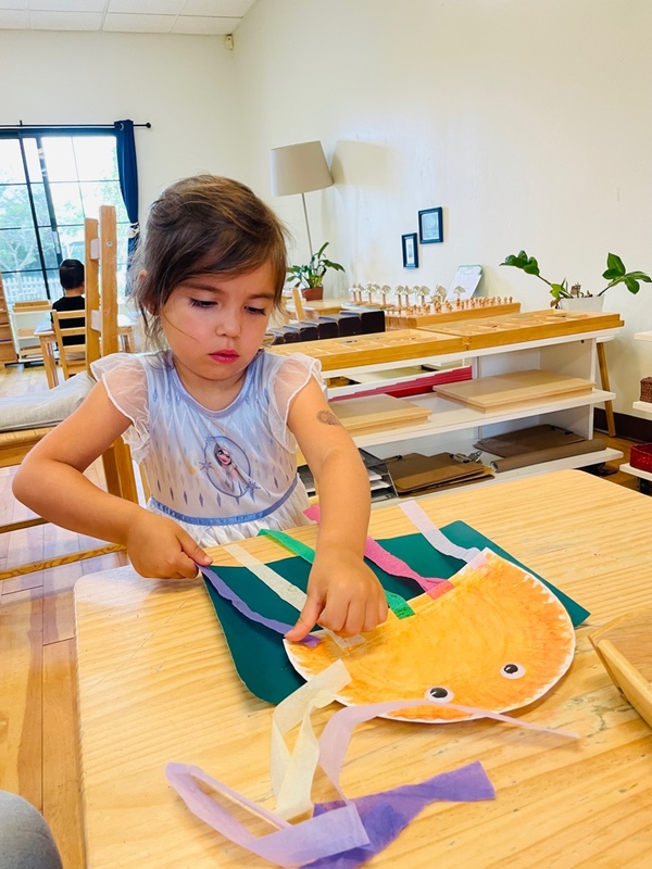 Children are working as artists at Lifetime Montessori School
