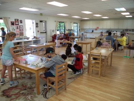 Children in a Montessori classroom using their Discipline Skills