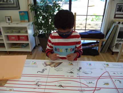 Child focusing at Lifetime Montessori Elementary School