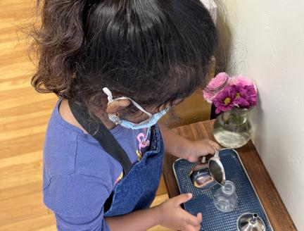 Child independently working in a Montessori Classroom in San Diego