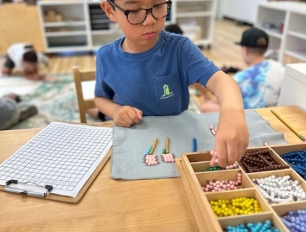 Montessori Elementary Child working independently