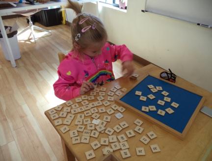 Montessori student working independently