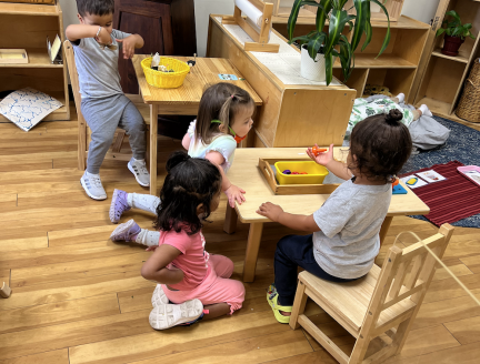 Children working independently in a Montessori Classroom in San Diego