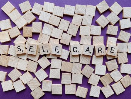 Self Care Strategies with scrabble letters