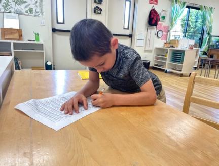 Child with many skill sets having confidence in a San Diego Montessori school