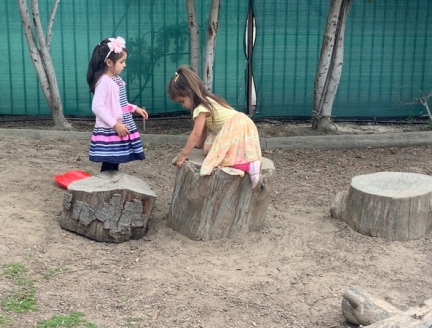 Montessori Outdoor Education two children playing at Lifetime Montessori School