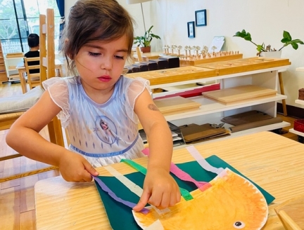 Children are working as artists at Lifetime Montessori School