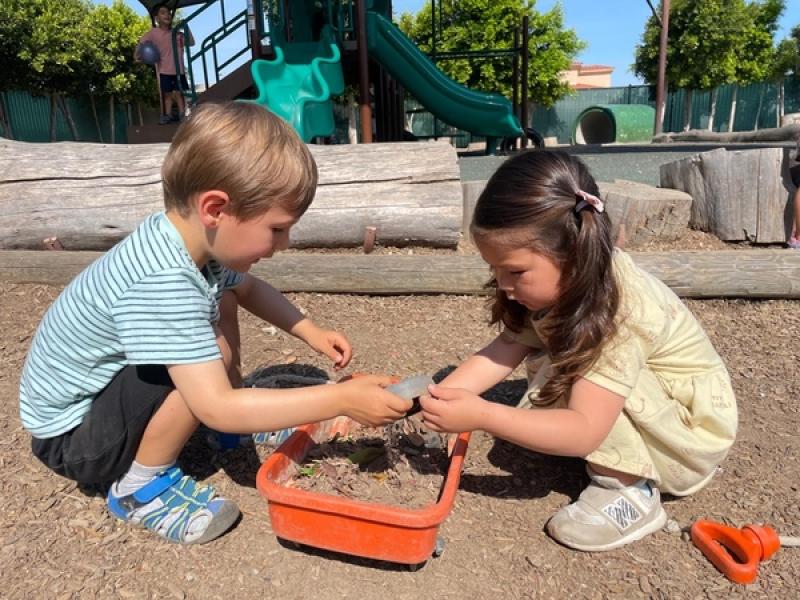 Children working outside Elementary Montessori School