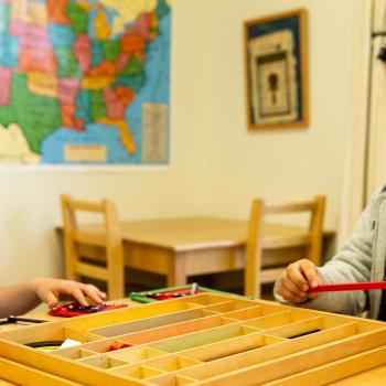 Elementary Children Solving math problems at Lifetime Montessori School in San Diego, Highly rated for Best Montessori School in San Diego