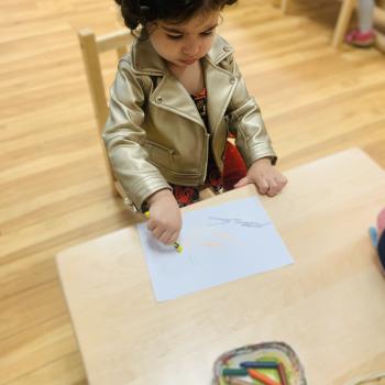 Toddler independently drawing at Lifetime Montessori School 