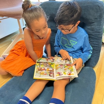 Elementary Children reading together at Lifetime Montessori School in San Diego