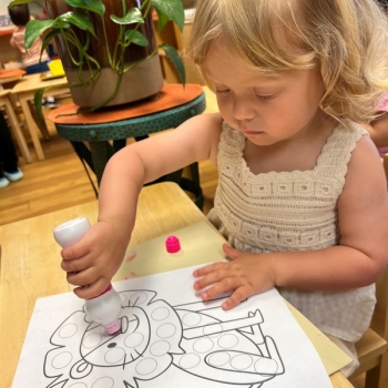 Toddler independently working on art at Lifetime Montessori School 