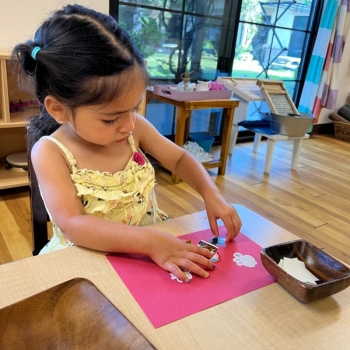 Toddler independently working on art at Lifetime Montessori School 