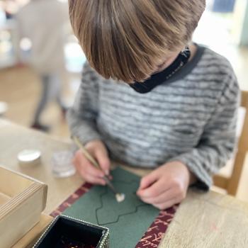 Montessori primary child working at Lifetime Montessori School in San Diego