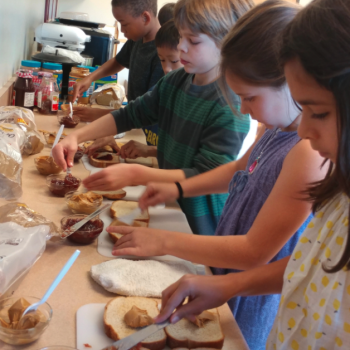 Elementary children preparing snacks at Lifetime Montessori school