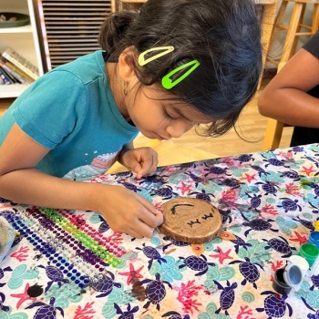 Elementary Child working at Lifetime Montessori School in San Diego