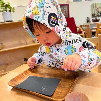 Toddler independently working on art at Lifetime Montessori School 