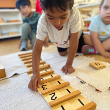 Montessori primary child working at Lifetime Montessori School in San Diego