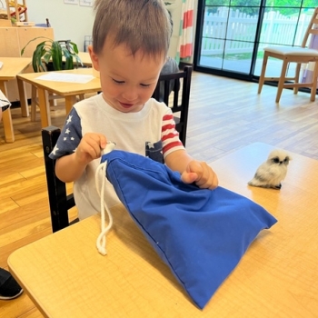 Montessori primary child working at Lifetime Montessori School in San Diego