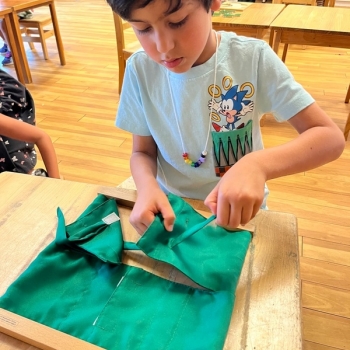 Montessori primary child working at Lifetime Montessori School in San Diego