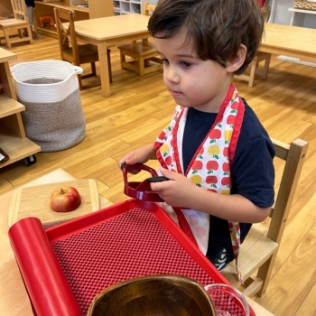 Montessori primary child working at Lifetime Montessori School in San Diego