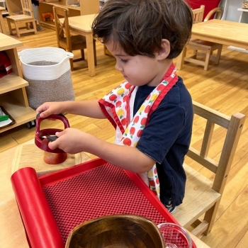 Montessori primary child working at Lifetime Montessori School in San Diego