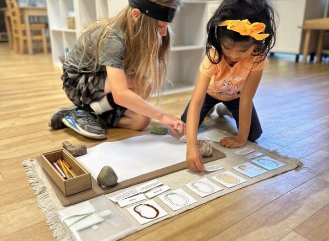 Elementary Child solving math problems at Lifetime Montessori School in San Diego