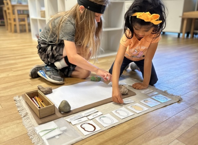 Elementary Child solving math problems at Lifetime Montessori School in San Diego